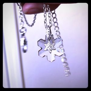 Cut glass snowflake necklace.